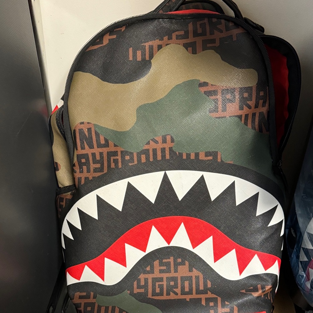 Sprayground Green and Red Shark Mouth Backpack - Picture 1 of 9